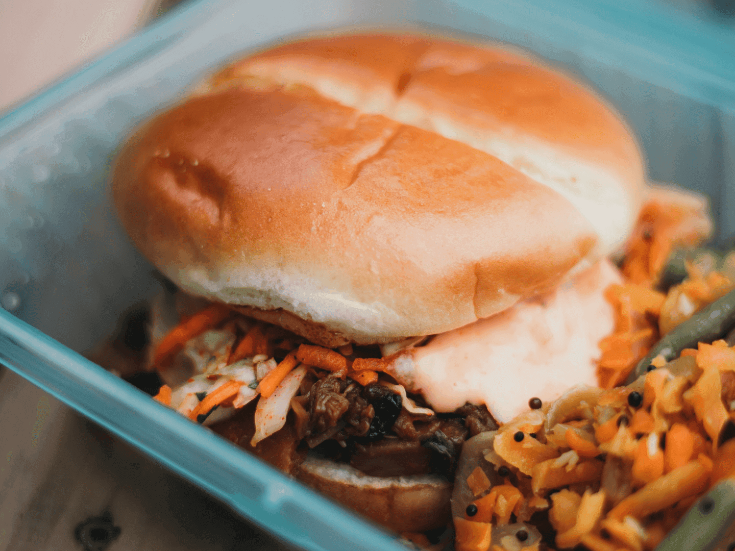 burger in green container