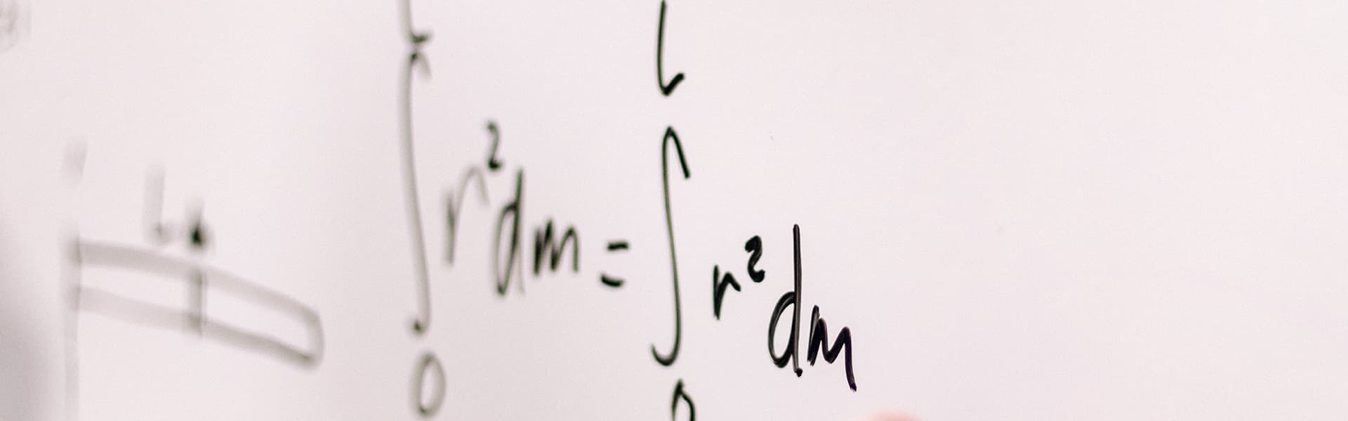 Math on a whiteboard.