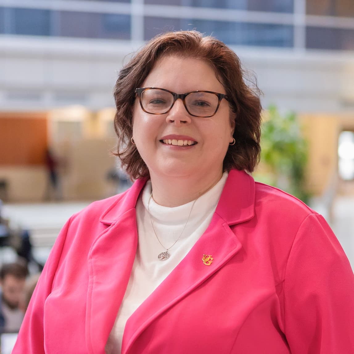Dr. Stacey Scott smiles at camera while in U of G's Summerlee Science Complex